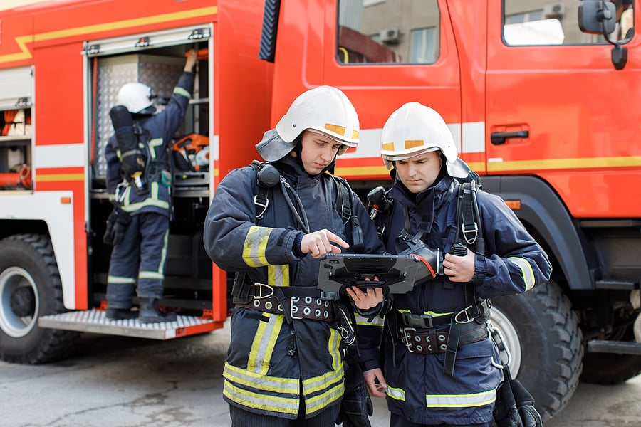 firefighters using tablet